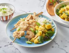 Sesame prawn skewers with asian mango salad